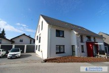 Au�enansicht mit Garagen 4-Zimmer Maisonette-Wohnung mit Garage in Dortmund-Kirchh�rde