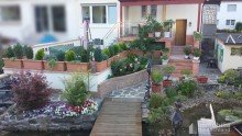 Garten im Sommer Ein- bis Zweifamilienhaus mit Garage und Garten in Dortmund-Barop