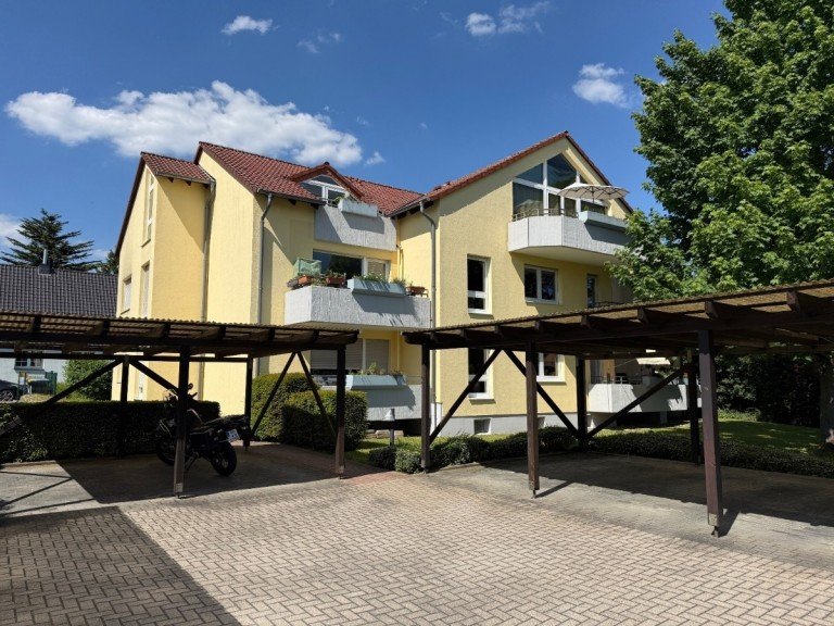 Hinteransicht vom Carporthof Dortmund - Benninghofen Dachgeschosswohnung Gl�cksgriff in Benninghofen: Gro�z�gige Dachgeschosswohnung mit S�d-Balkon und Blick auf den Lohbach
