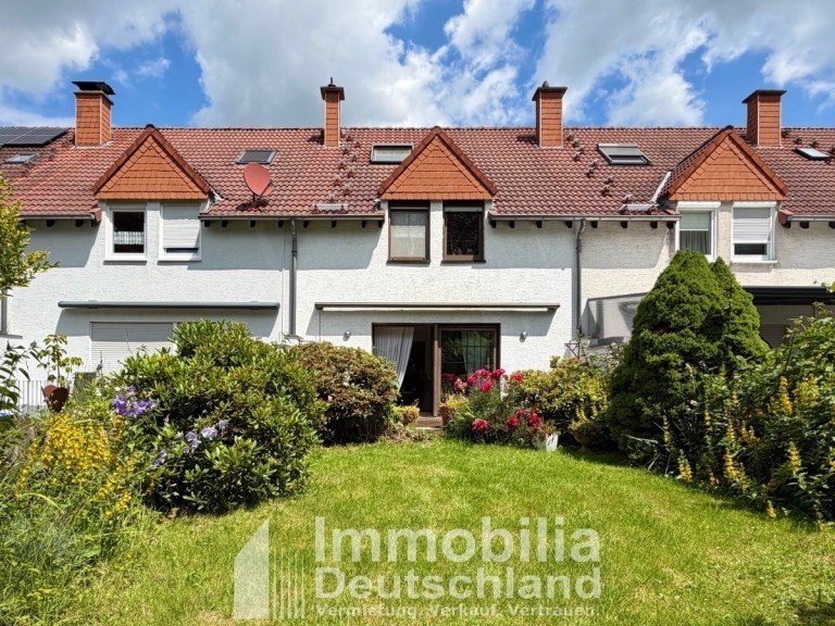 Gartenansicht Schwerte Reihenmittelhaus Familiengl�ck in Schwerte-Wandhofen: Reihenmittelhaus mit Garten nahe der Ruhrauen