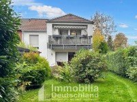 Hauptbild Modernisiert, großzügig & familienfreundlich - Zweifamilienhaus zum Ankommen
