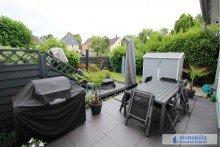 Terrasse mit Blick in den Garten Modernes Reihenendhaus mit Garten und Garage in Dortmund-Derne
